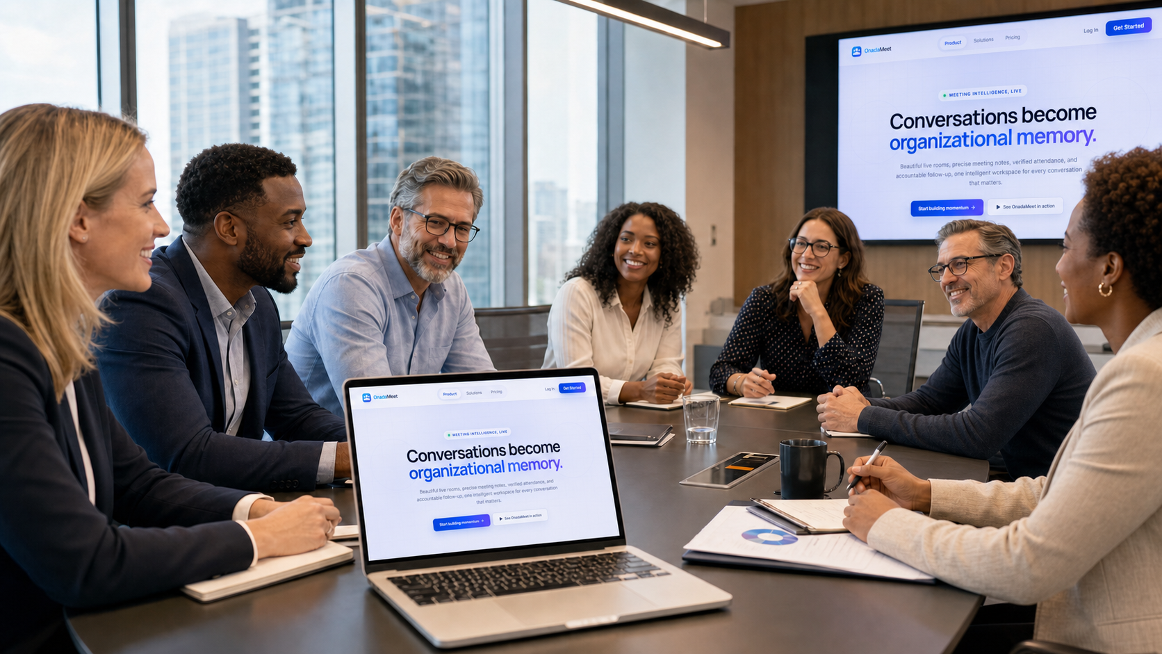 A diverse team of Black and white professionals using OnadaMeet around a conference table